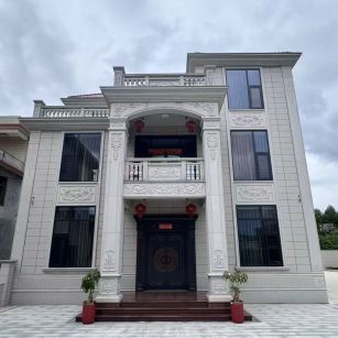 驻马店 芝麻白石材别墅干挂案例展示